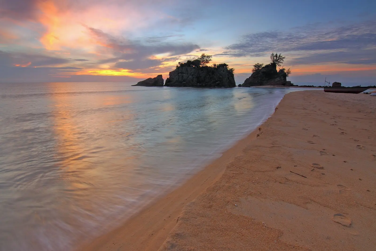 Calm ocean coastline at sunrise, a symbol of hope and new beginnings